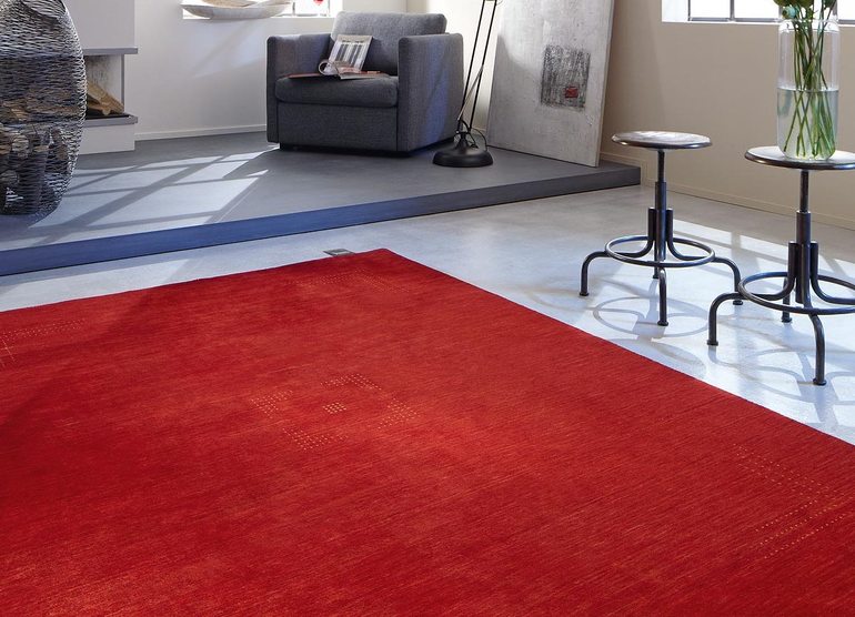 Тлумачення сонників: значення червоного килима на підлозі та стіні, трактування згорнутого в рулон килимового виробу